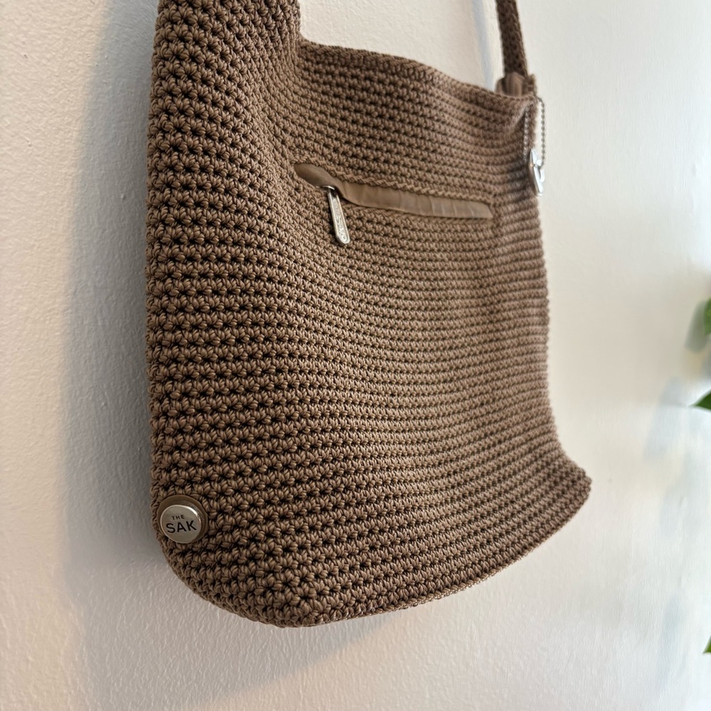 The SAK tan slouchy crocheted weave shoulder crossbody hobo bag boho festival